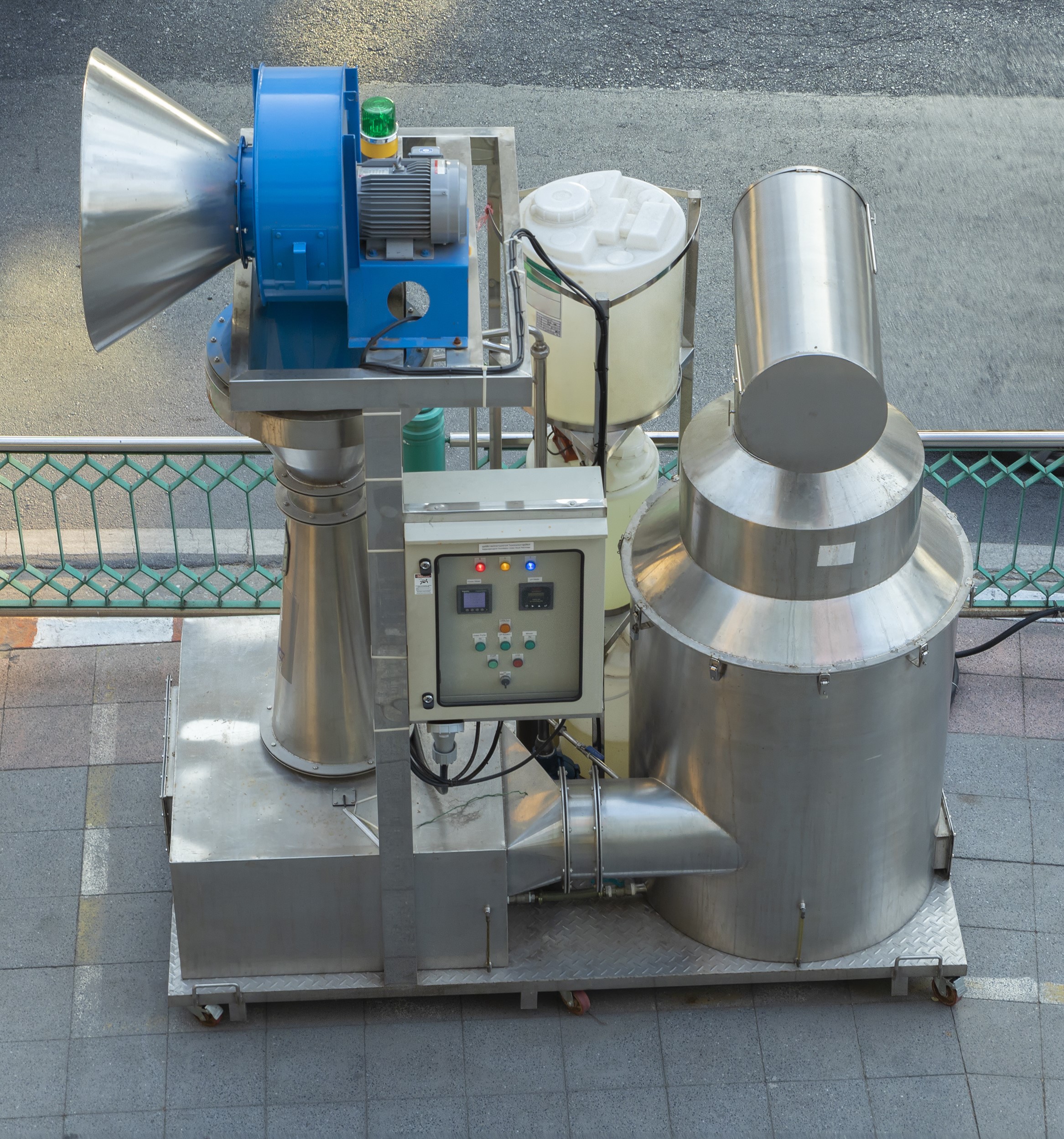 The Water spray robot for treatment the air from PM 2.5. JET VENTURI SCRUBBER ERIG. Ginormous Air Purifier machine installed on footpath in Bangkok, Thailand..